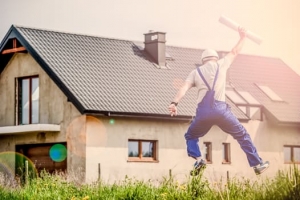 man in front of house